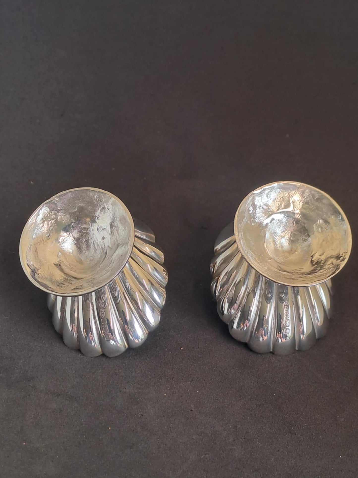 Fantastic Pair of solid silver individual cast table salts with cherub musicians.