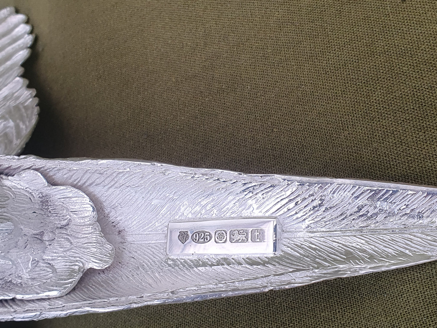 Pair of solid silver pheasants. Cast, fine hand chased detail. 1.945KG. 28 & 32 CM.