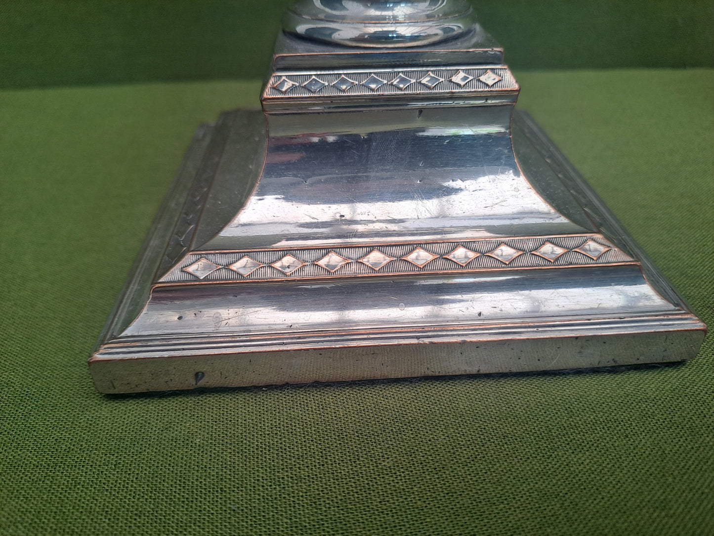 Old Sheffield Plate candlesticks.