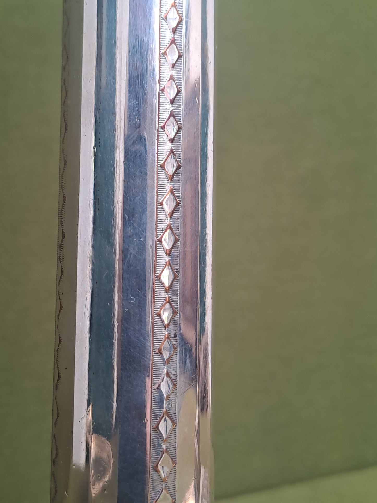 Old Sheffield Plate candlesticks.