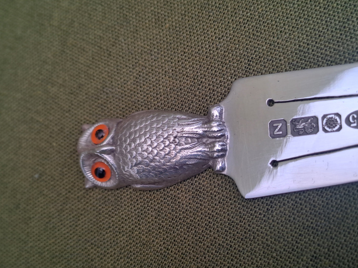 Solid Silver owl book mark.