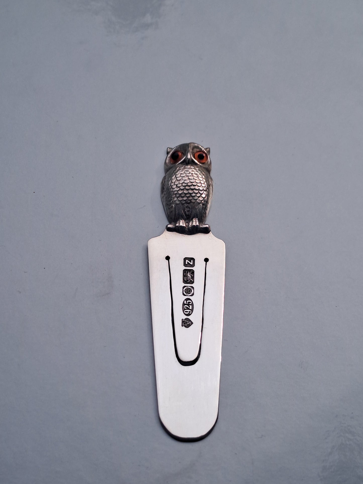 Solid Silver owl book mark.