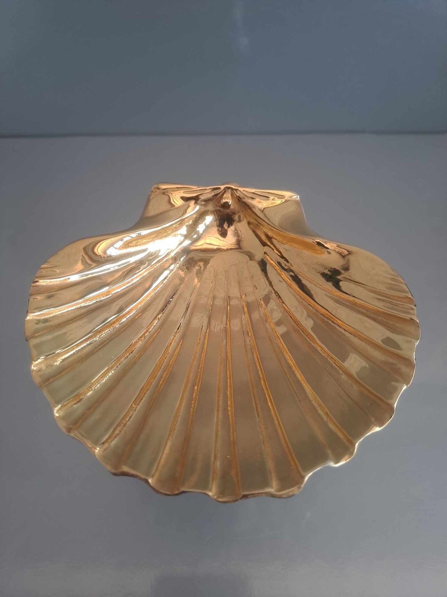 Pair of solid silver dolphin & scallop dishes. Sheffield 2024.