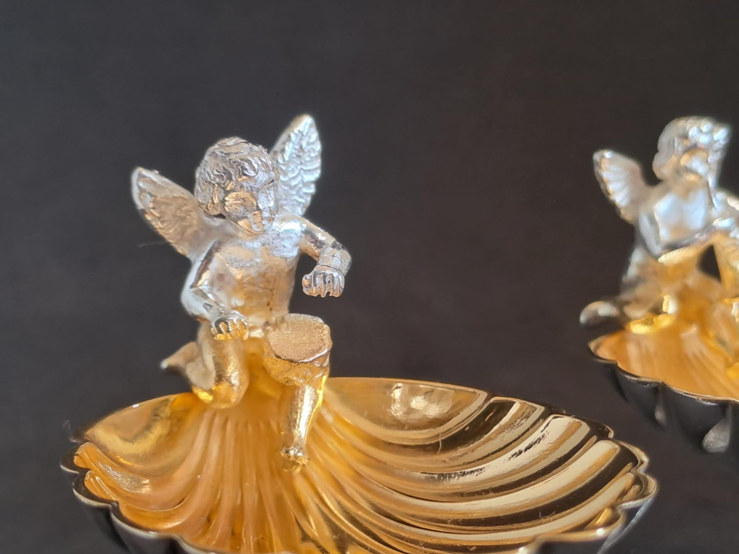 Fantastic Pair of solid silver individual cast table salts with cherub musicians.