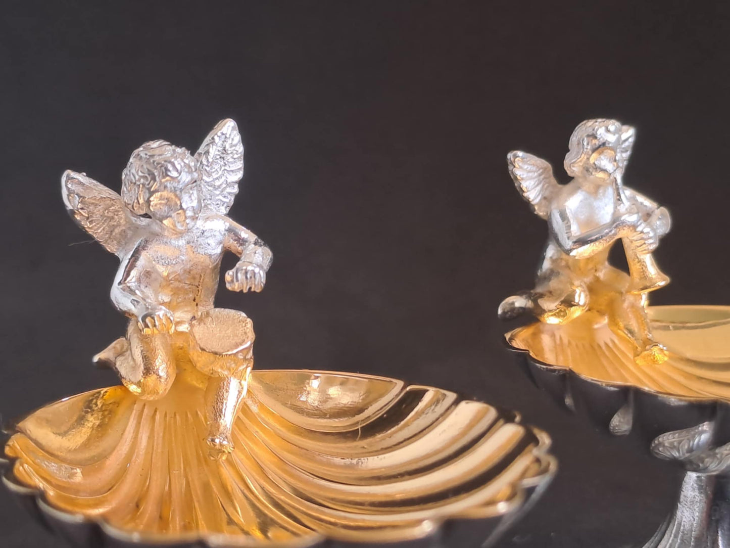 Fantastic Pair of solid silver individual cast table salts with cherub musicians.