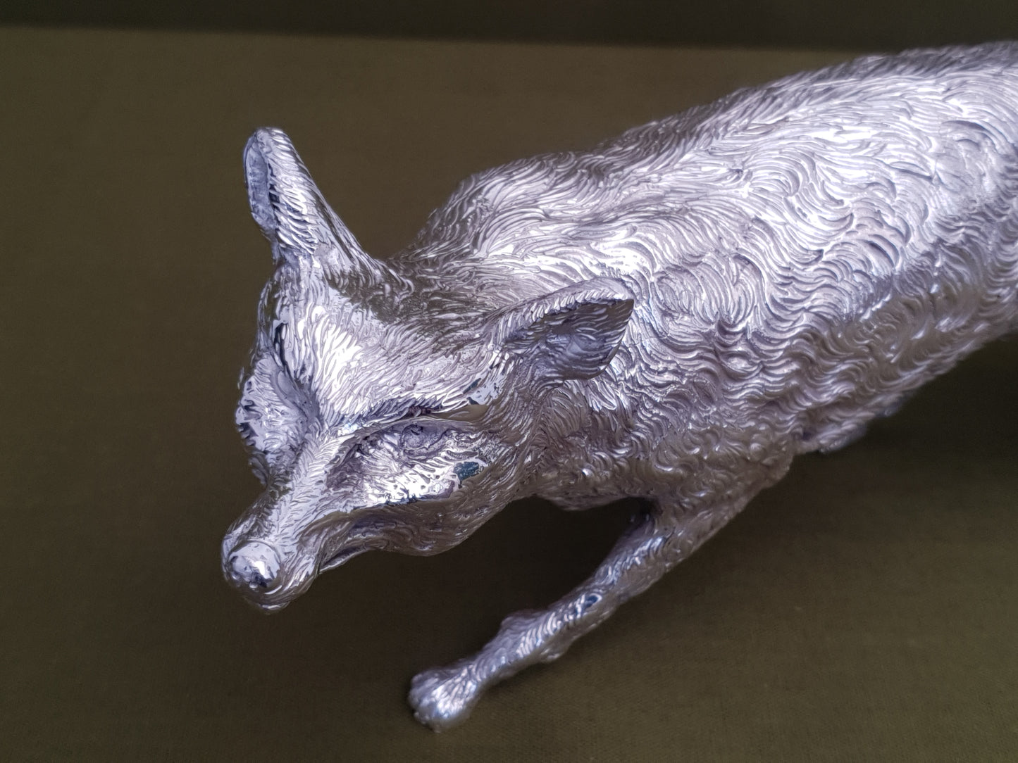 Solid silver fox. Cast, with fine hand chased detail. 32CM long. 1.35 KG