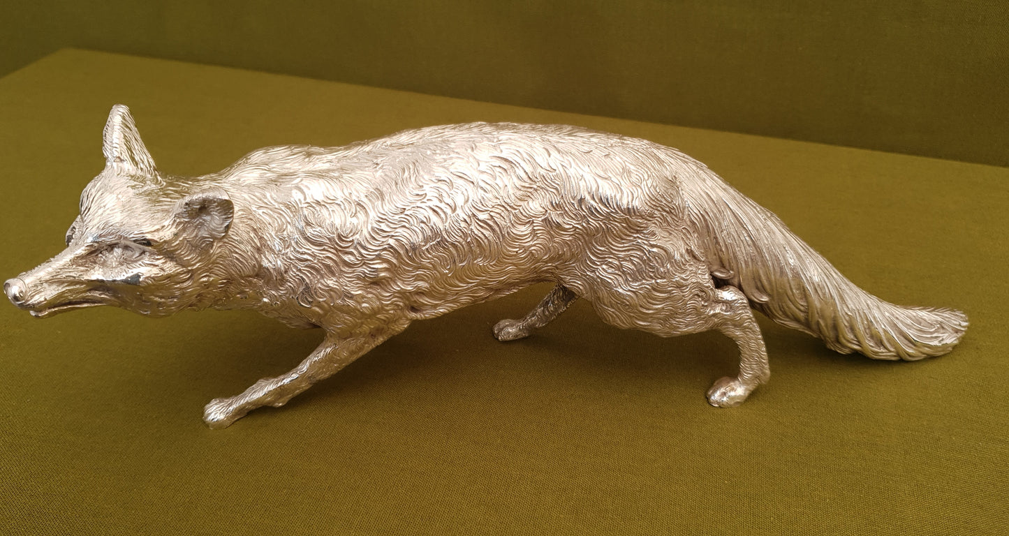 Solid silver fox. Cast, with fine hand chased detail. 32CM long. 1.35 KG