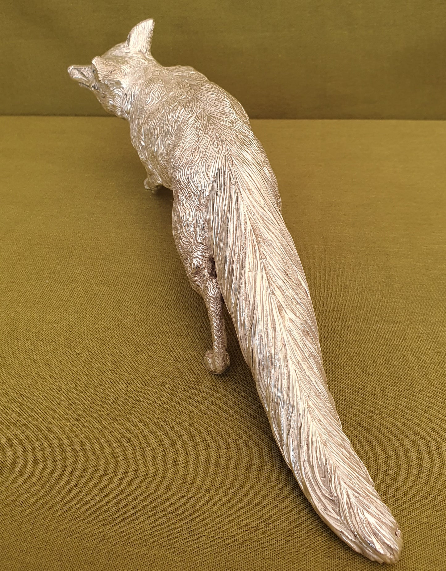 Solid silver fox. Cast, with fine hand chased detail. 32CM long. 1.35 KG