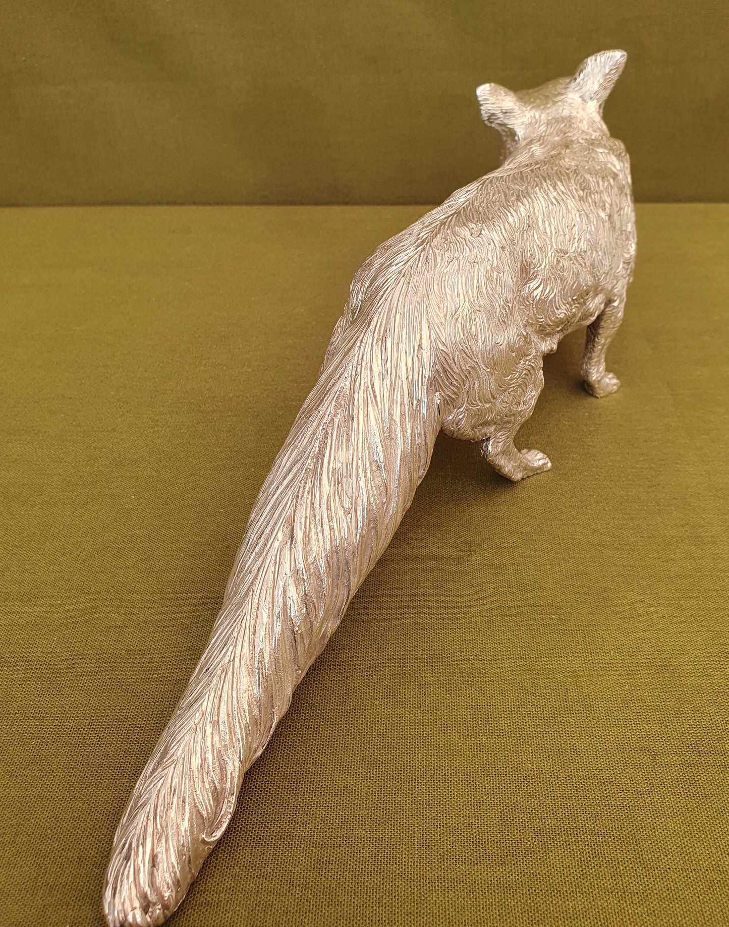 Solid silver fox. Cast, with fine hand chased detail. 32CM long. 1.35 KG