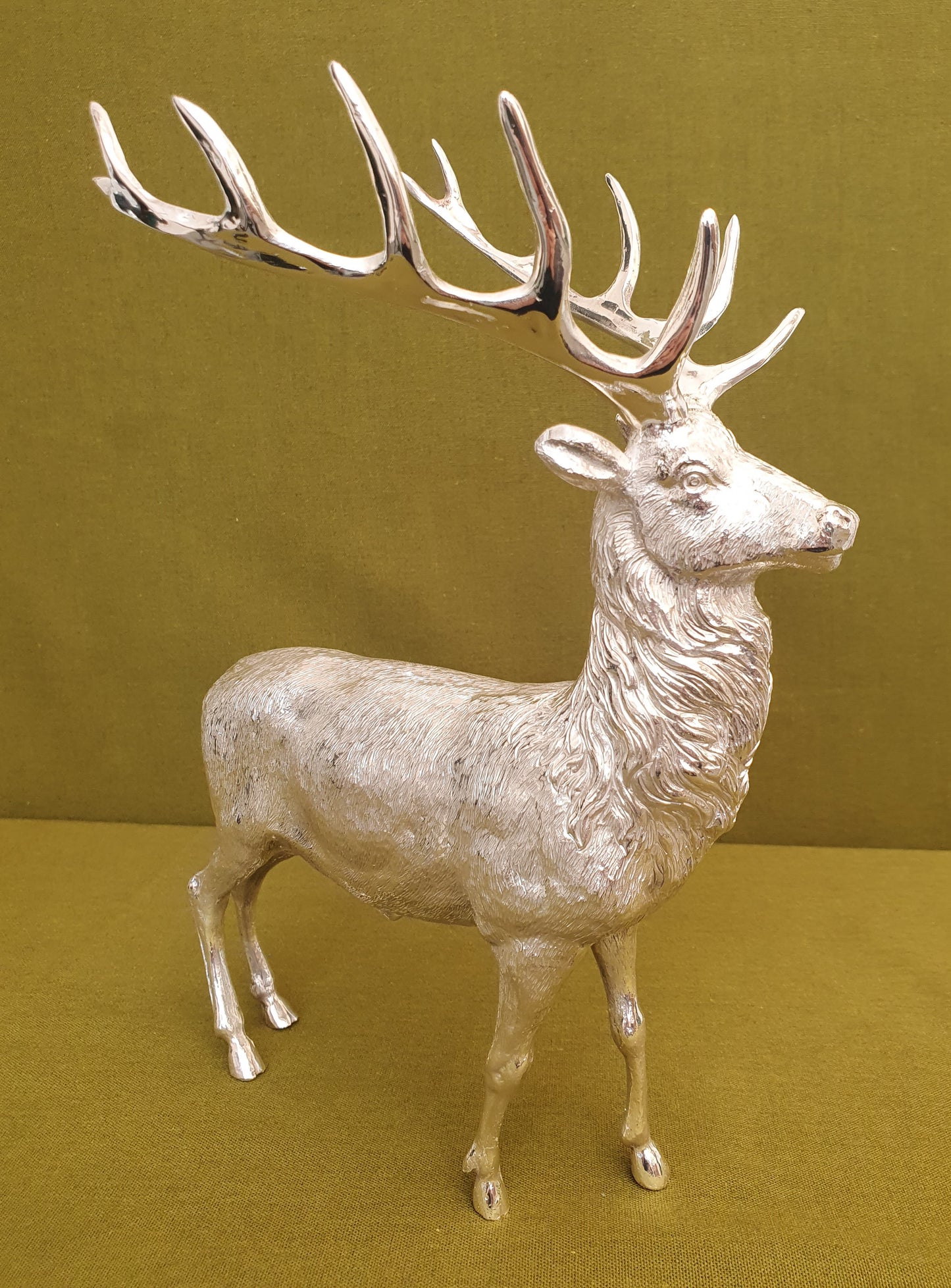 Solid silver stag. Cast, with fine hand chased detail. 24 CM tall. 930 grams.