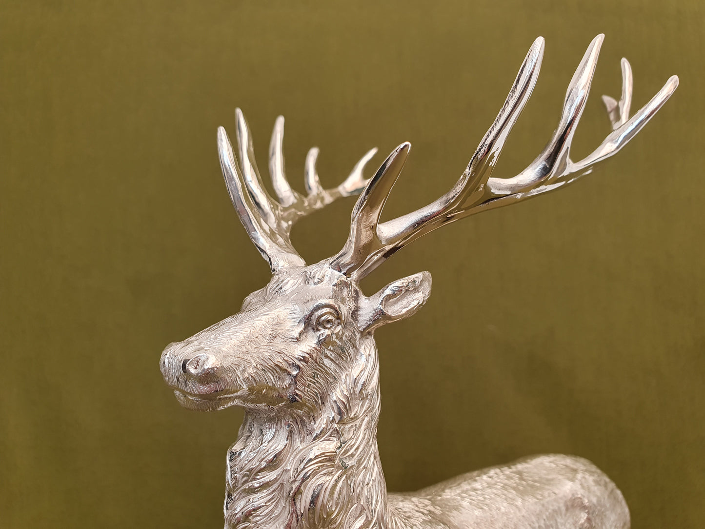 Solid silver stag. Cast, with fine hand chased detail. 24 CM tall. 930 grams.