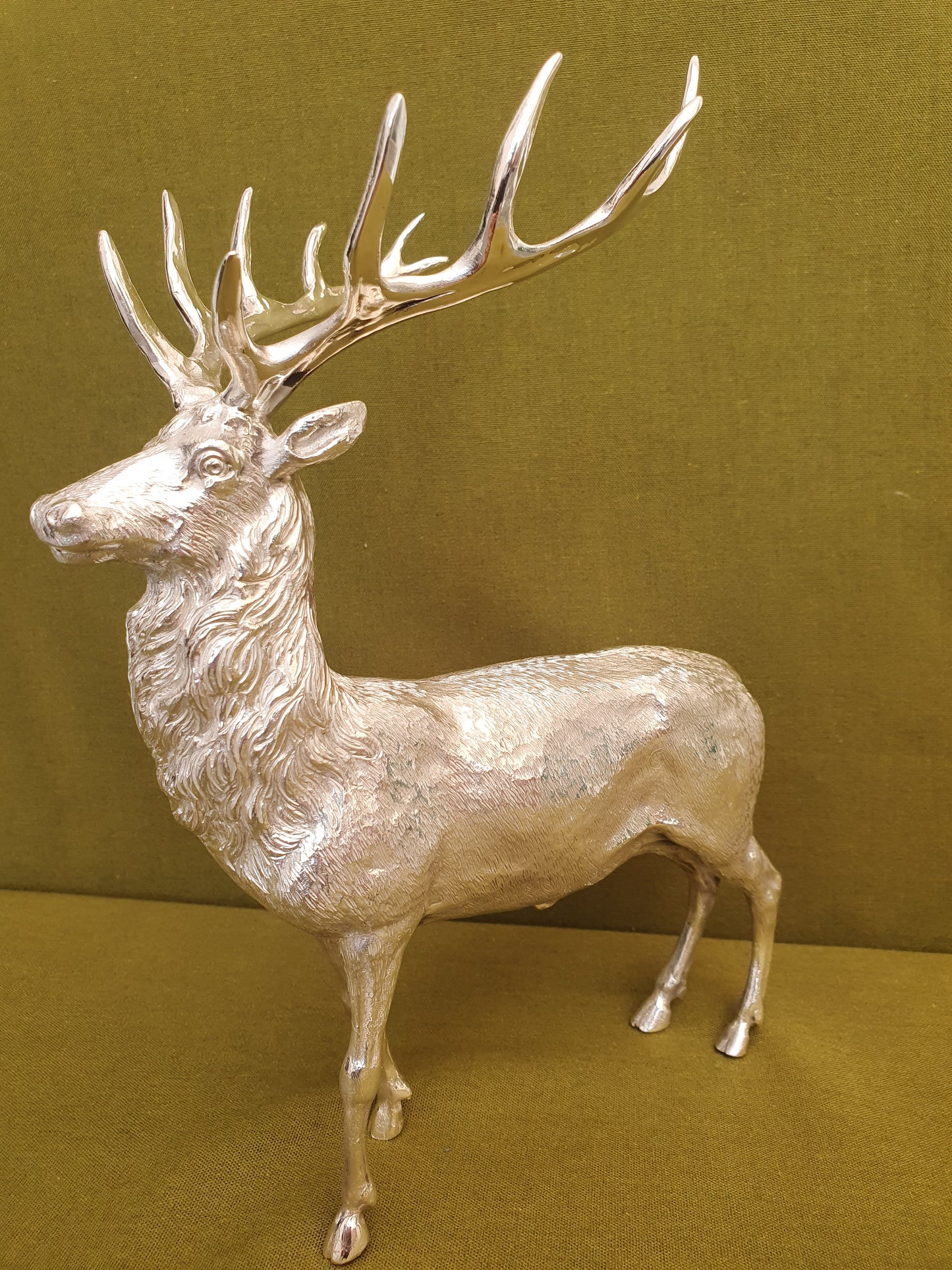 Solid silver stag. Cast, with fine hand chased detail. 24 CM tall. 930 grams.