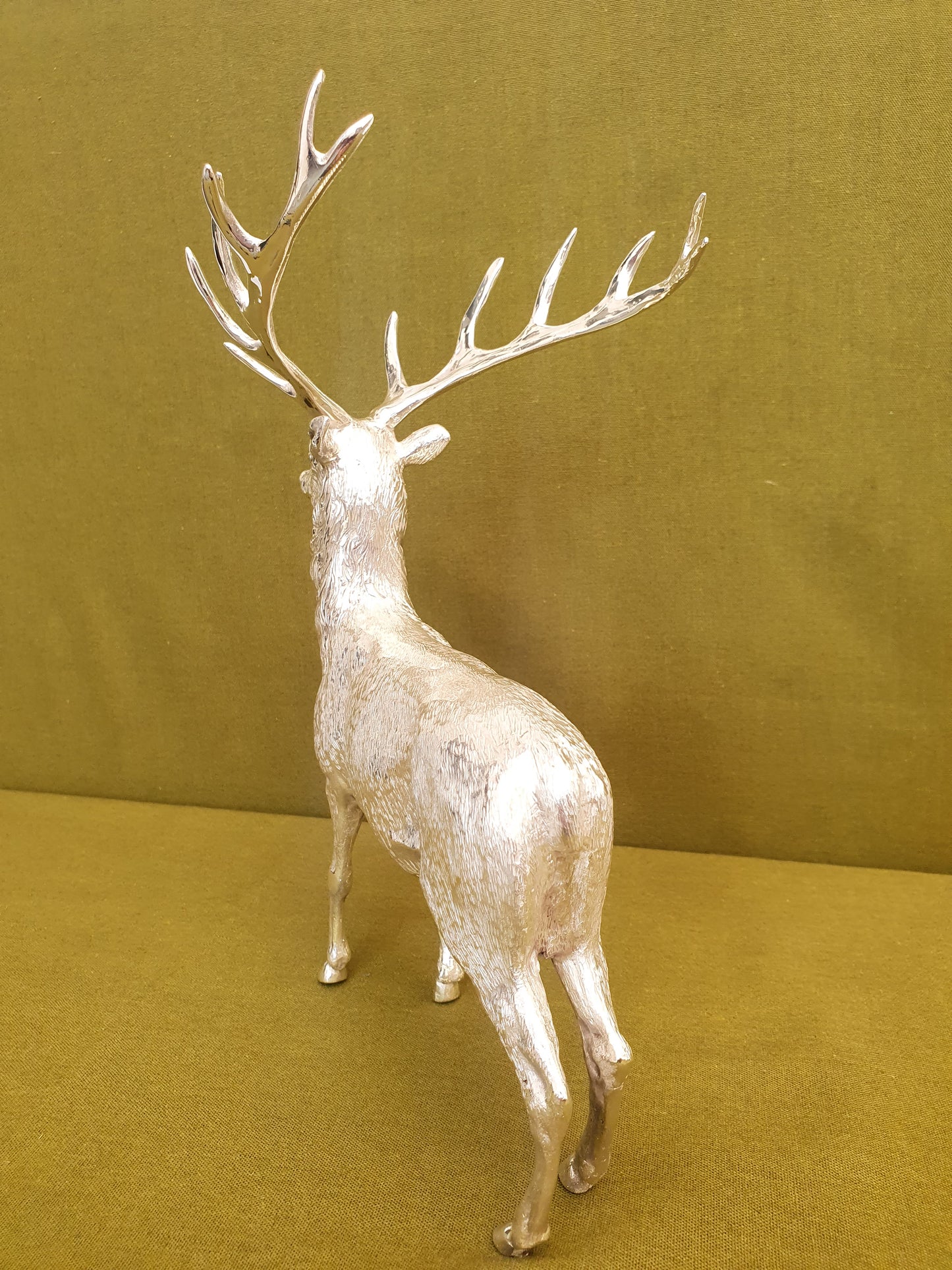 Solid silver stag. Cast, with fine hand chased detail. 24 CM tall. 930 grams.