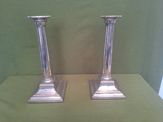 Old Sheffield Plate candlesticks.