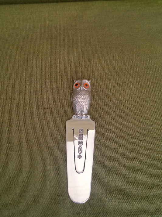 Solid Silver owl book mark.