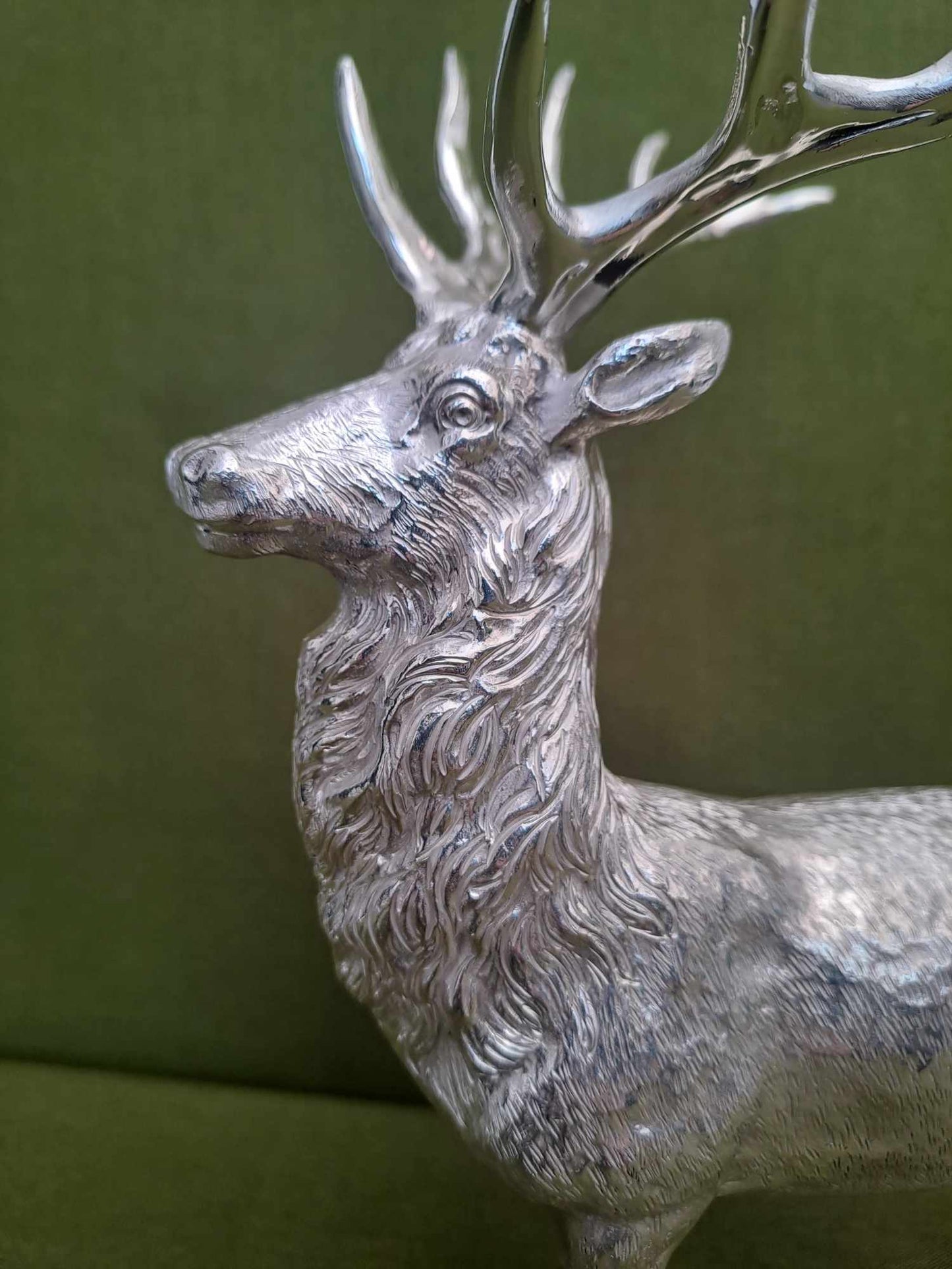 Solid silver stag. Cast, with fine hand chased detail. 24 CM tall. 930 grams.