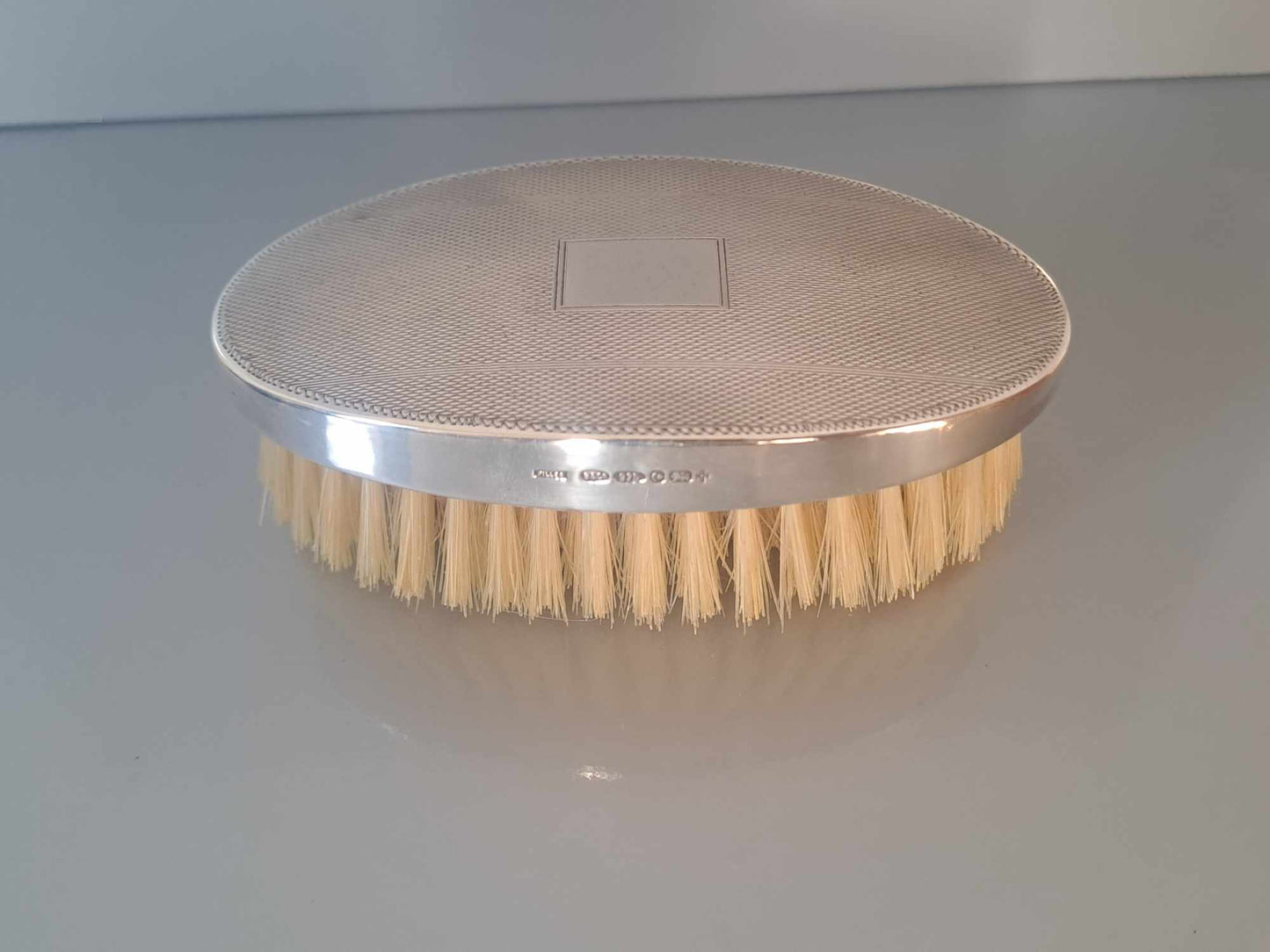 Solid silver gents hair brush. W I Broadway & Co. Millennium year mark 2000.