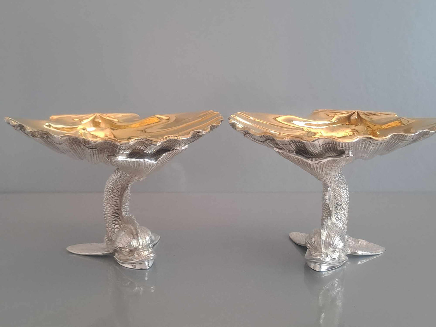 Pair of solid silver dolphin & scallop dishes. Sheffield 2024.