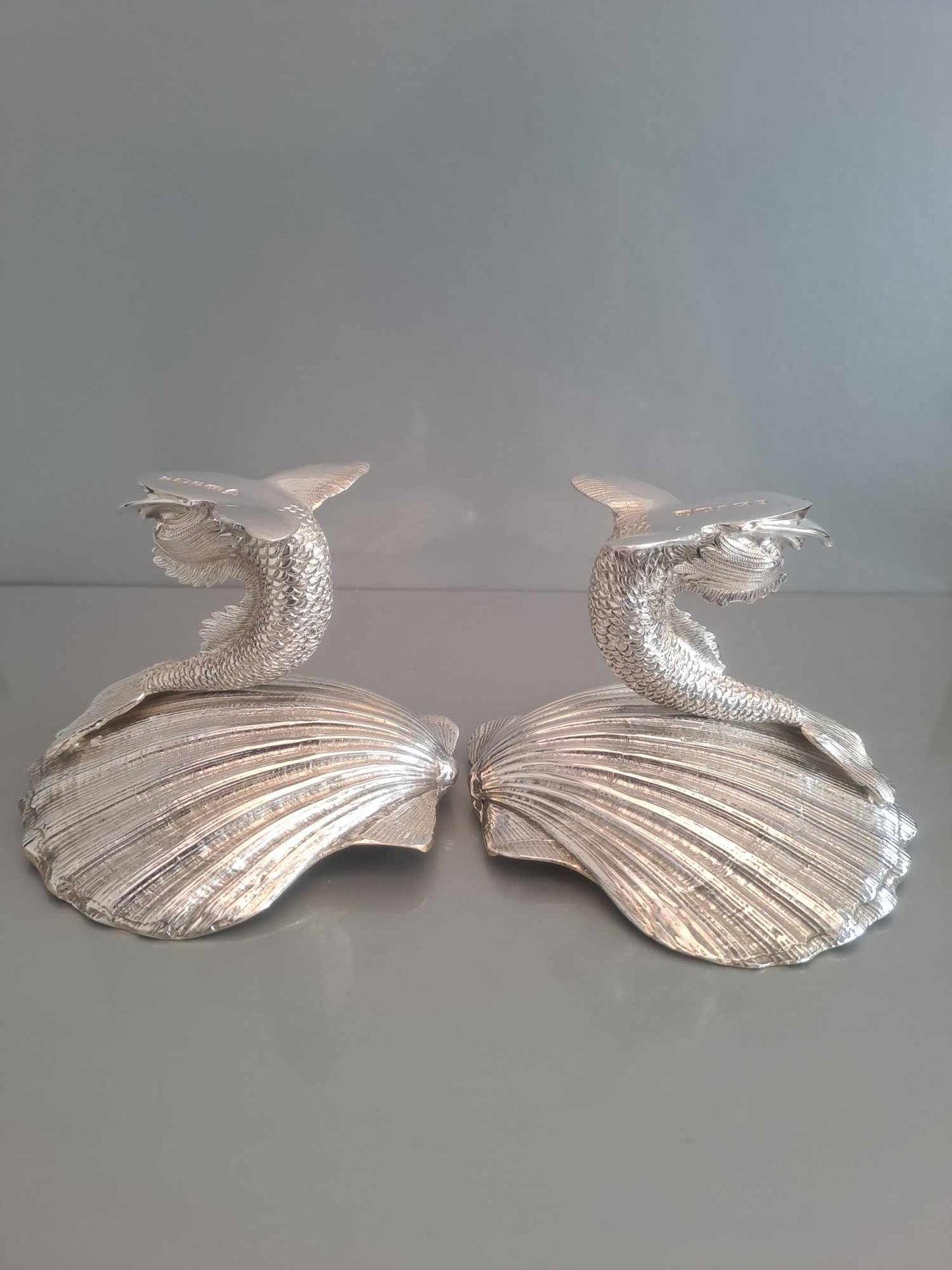 Pair of solid silver dolphin & scallop dishes. Sheffield 2024.